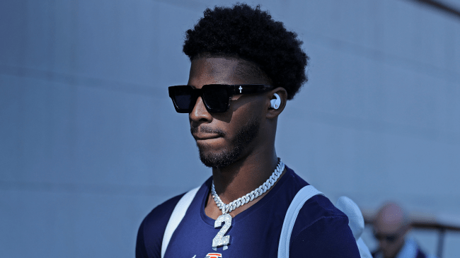 Shedeur Sanders walks out of the tunnel before a game.