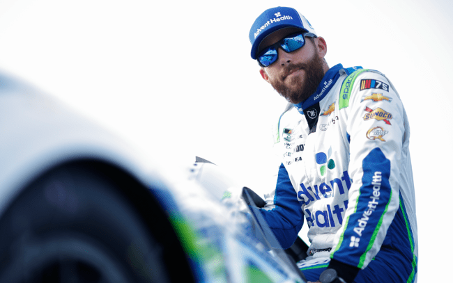 Ross Chastain sits on car - Kyle Petty