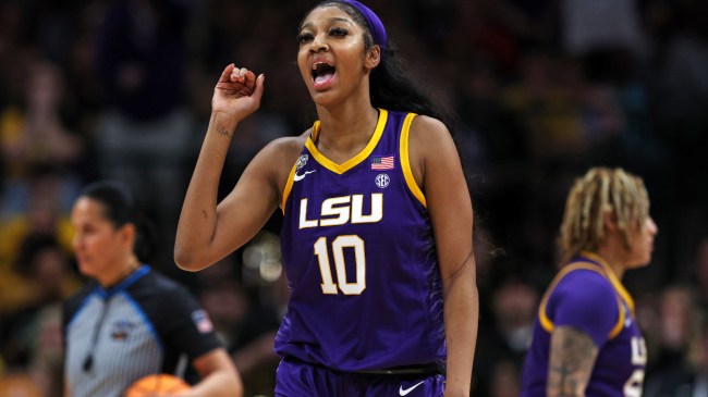 Angel Reese celebrates LSU's national championship win.