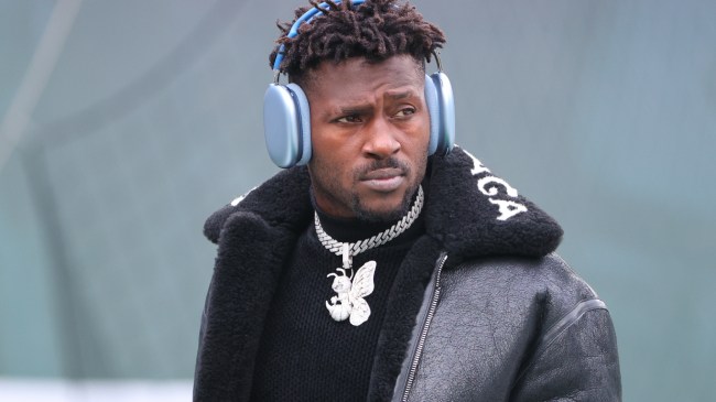 Antonio Brown walks onto the field before an NFL game.
