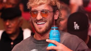 Crowd Throws Bottles At Logan Paul And KSI As They Flee With Security