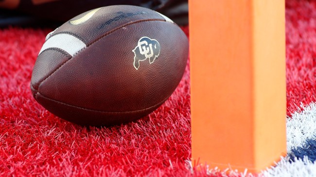 A Colorado Buffaloes logo on a football.