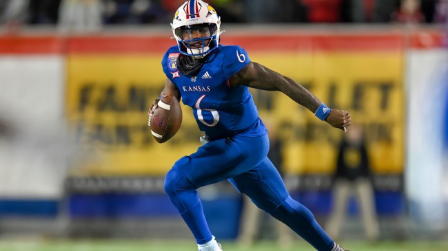Jalon Daniels scrambles for yardage during Kansas's bowl game vs. Arkansas.