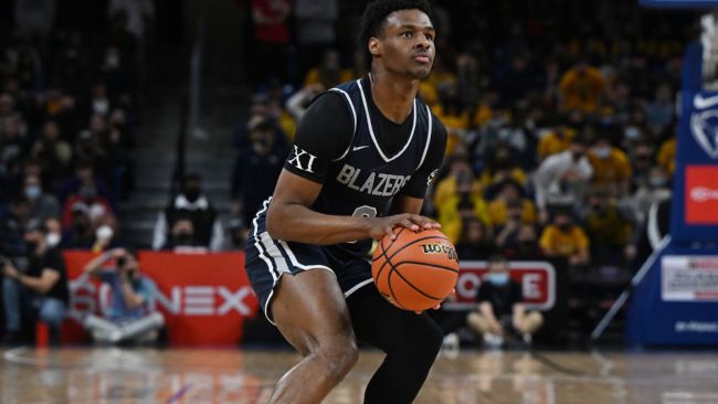 lebron's son bronny james shooting a basketball