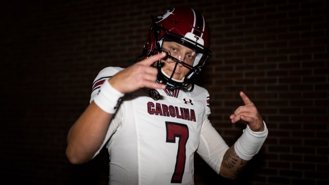 Spencer Rattler poses for a photo at Ben Hill Griffin Stadium ahead of a matchup against the Florida Gators.