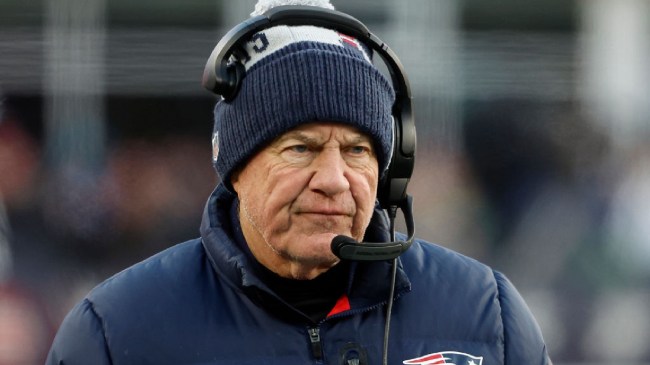 Bill Belichick on field with headset