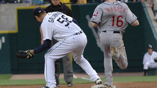 Jim Joyce looks on to Armando Galarraga and makes a call