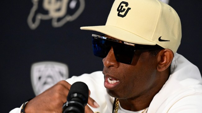 Deion Sanders speaks to the media.