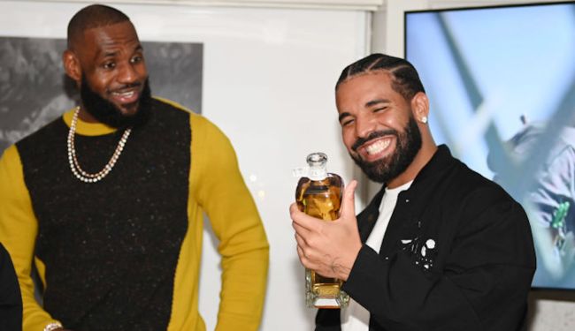 drake and lebron sharing a beverage