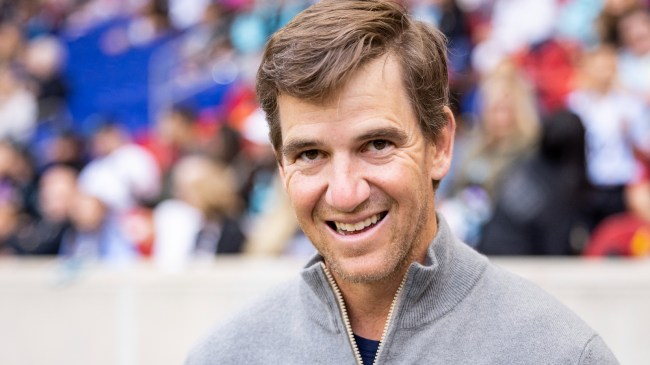 Eli Manning on the field before a soccer game in San Diego.