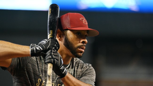 Tommy Pham warms up before a game against the Padres.