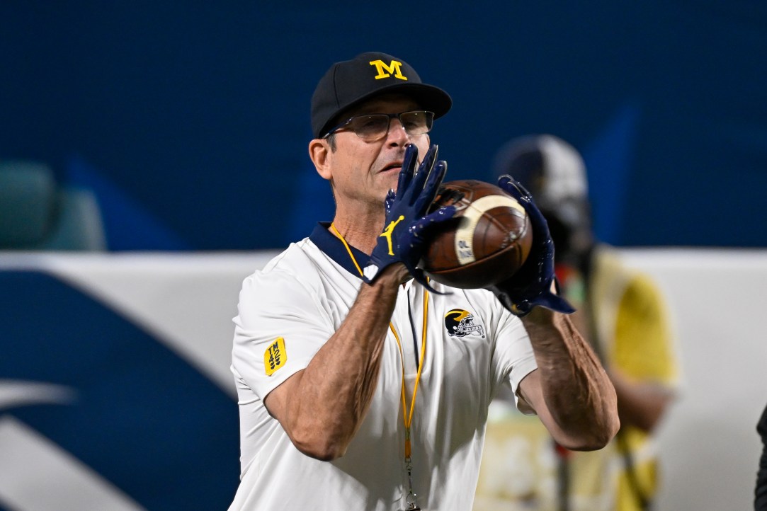 Jim Harbaugh pregame warmup catch gloves