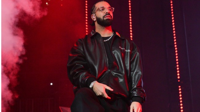 Drake performs on stage.