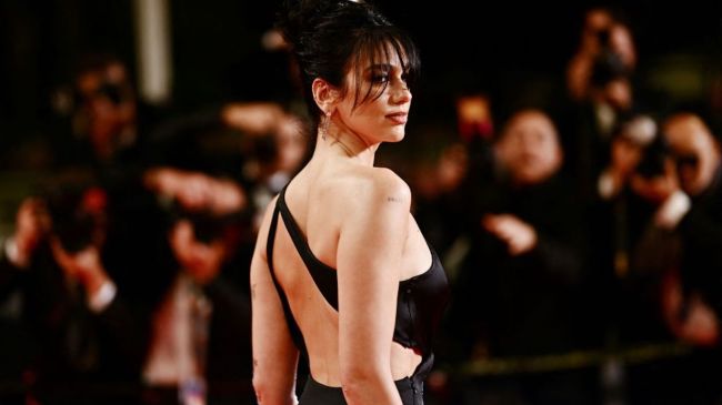 dua lipa in a black dress