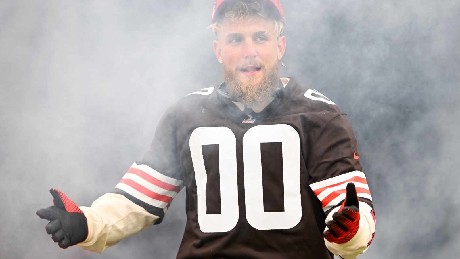 Jake Paul wearing a Cleveland Browns jersey before a game