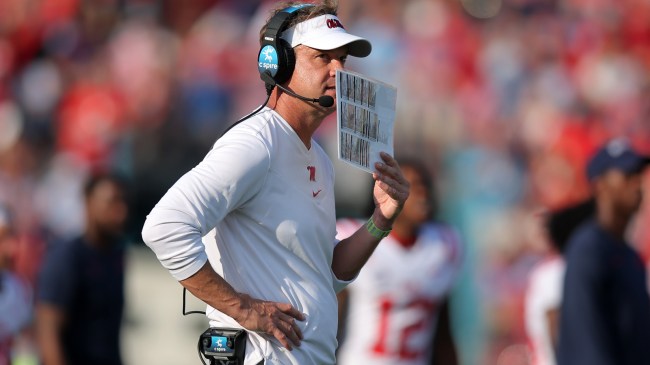 Lane Kiffin coaches from the sidelines during an Ole Miss game.