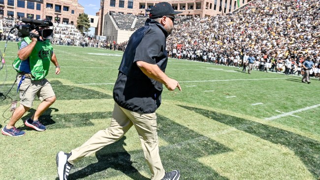 Matt Rhule walks to midfield after a game against Colorado.