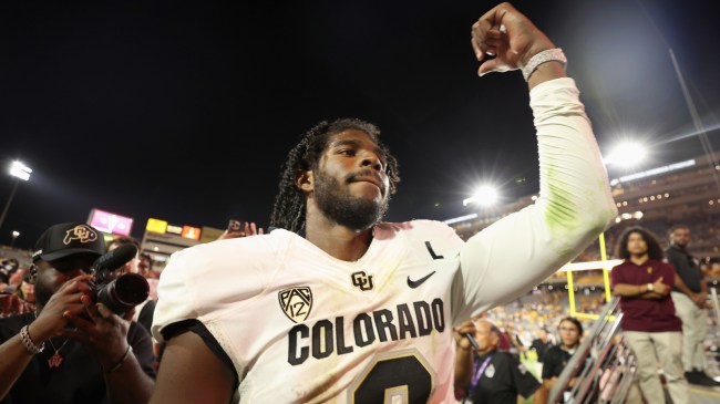 Shedeur Sanders flashes his watch to the crowd at Arizona State.