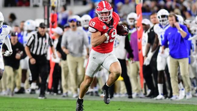 Brock Bowers runs with the ball during a game against Kentucky.