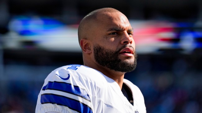 Dak Prescott on the field before a game between the Dallas Cowboys and Carolina Panthers.