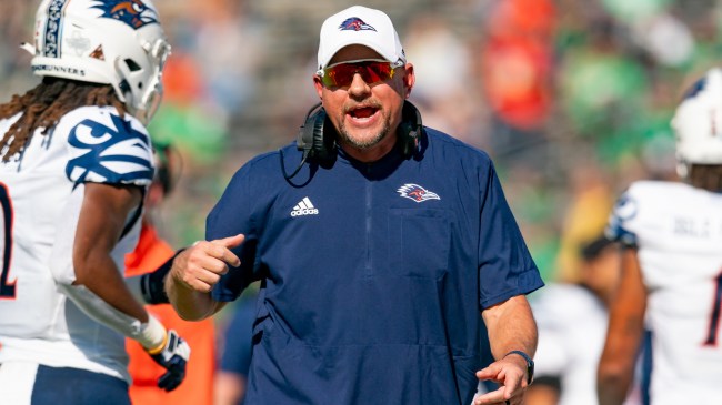 UTSA head coach Jeff Traylor walks the sideline during a game.