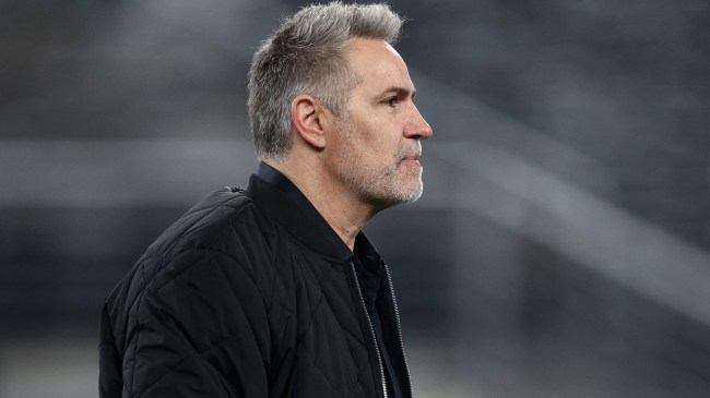 Kurt Warner watches on before an NFL game.
