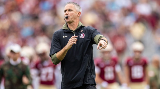 Mike Norvell directs his team before a game.