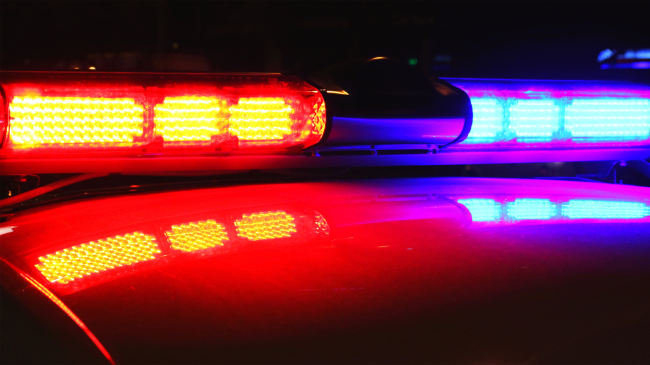 police car lights lit up at night