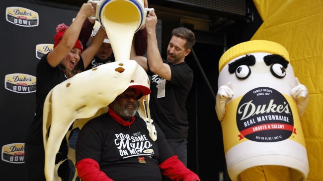 Maryland head coach Mike Locksley is doused in mayonnaise after a bowl game win.