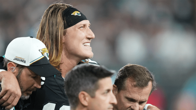Jacksonville Jaguars quarterback Trevor Lawrence helped off the field