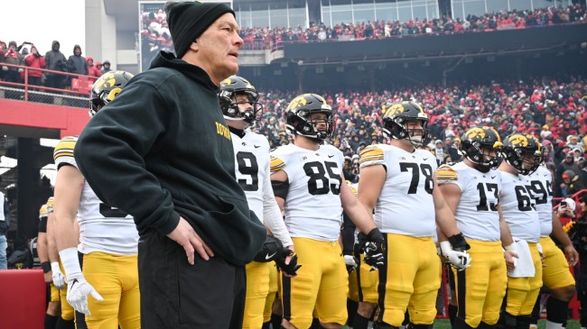 Kirk Ferentz enters the field with his Iowa football team before a game vs. Nebraska.