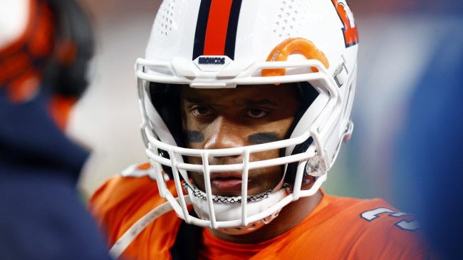 Russell Wilson on the sidelines during a Broncos game.