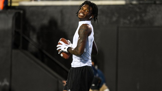 Travis Hunter on the field before a Colorado football game.