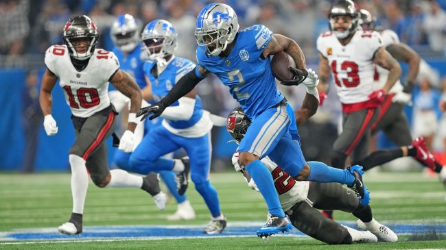 Lions DB CJ Gardner-Johnson returns an interception against the Bucs in the NFL Playoffs.