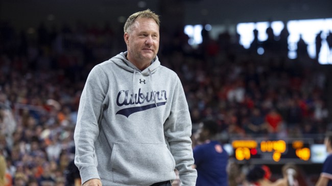 Hugh Freeze attends an Auburn basketball game.
