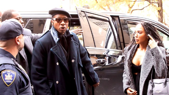 Jonathan Majors and Meagan Good arriving at court