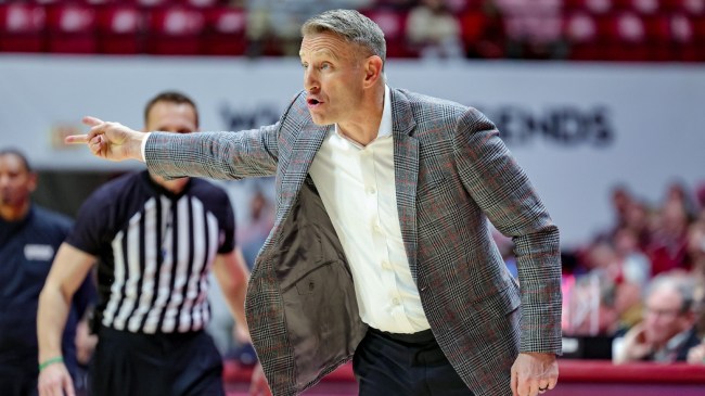 Alabama head coach Nate Oats coaches from the sidelines during a game against Vanderbilt.