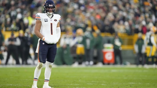Justin Fields on the field during a game between the Bears and Packers.