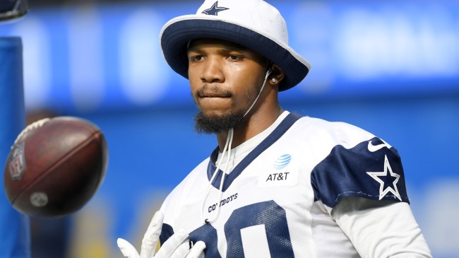 Tony Pollard warms up on the field for the Cowboys.