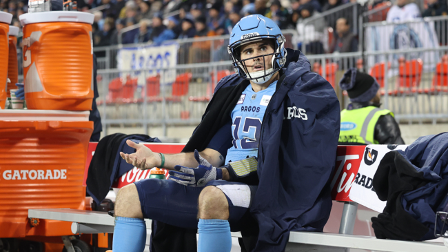 Toronto Argonauts QB Chad Kelly sits on the bench