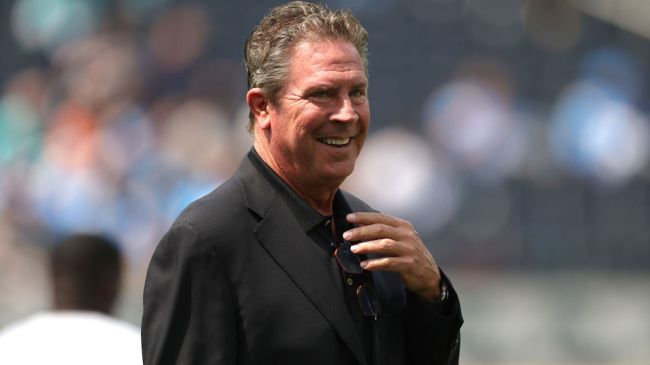 dan marino in a black suit