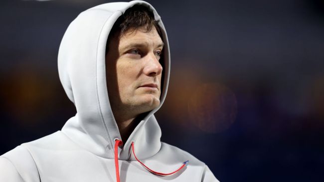 offensive coordinator ken dorsey wearing a hoodie