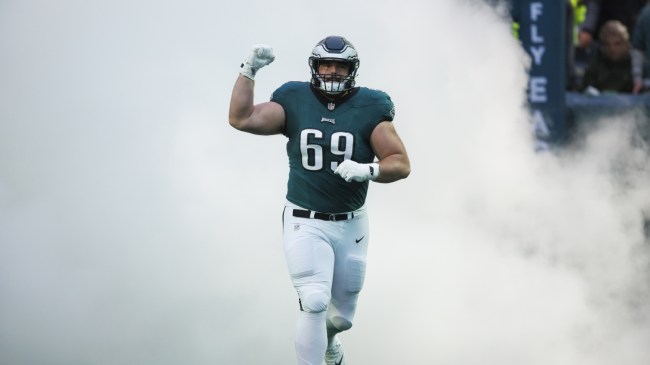 OL Landon Dickerson runs onto the field for a Philadelphia Eagles game.