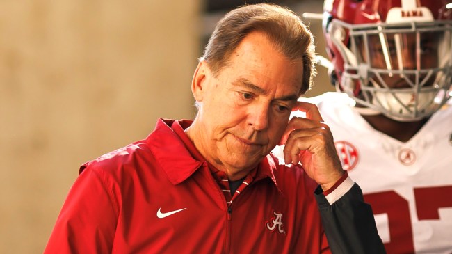 Nick Saban of the Alabama Crimson Tide walks to the field
