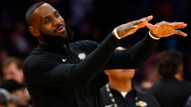 lebron james sticking out his hands
