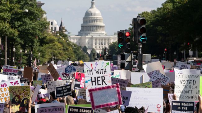 people protesting abortion rights in washinton dc in front of the capital