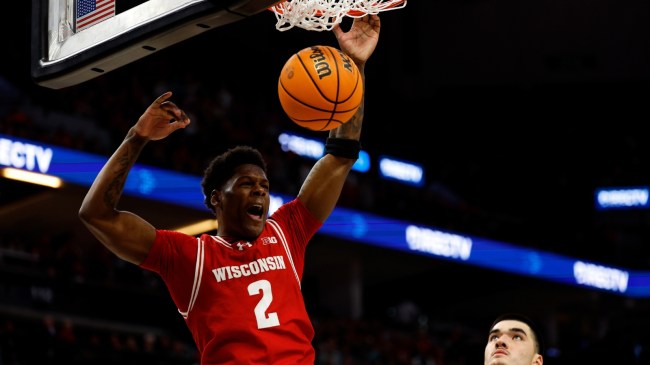 Wisconsin G AJ Storr slam dunks the basketball during a game vs. Purdue.