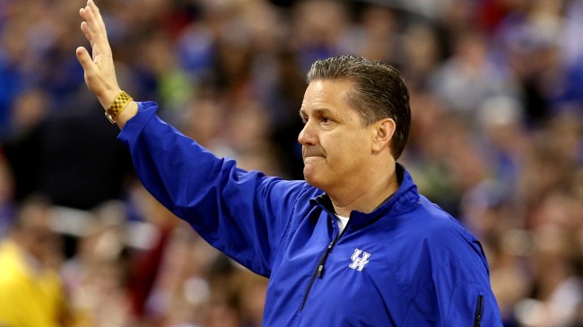 John Calipari waves to the crowd at the NCAA Tournament.