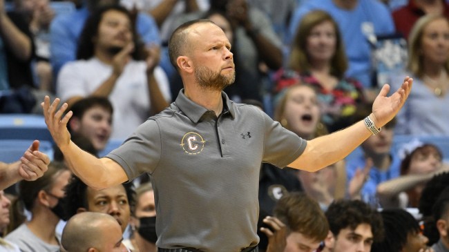 Pat Kelsey reacts to a play on the bench during a game between Charleston and North Carolina.