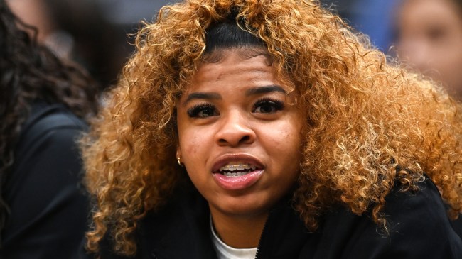 Colorado guard Shelomi Sanders watches from the bench in the NCAA Tournament.